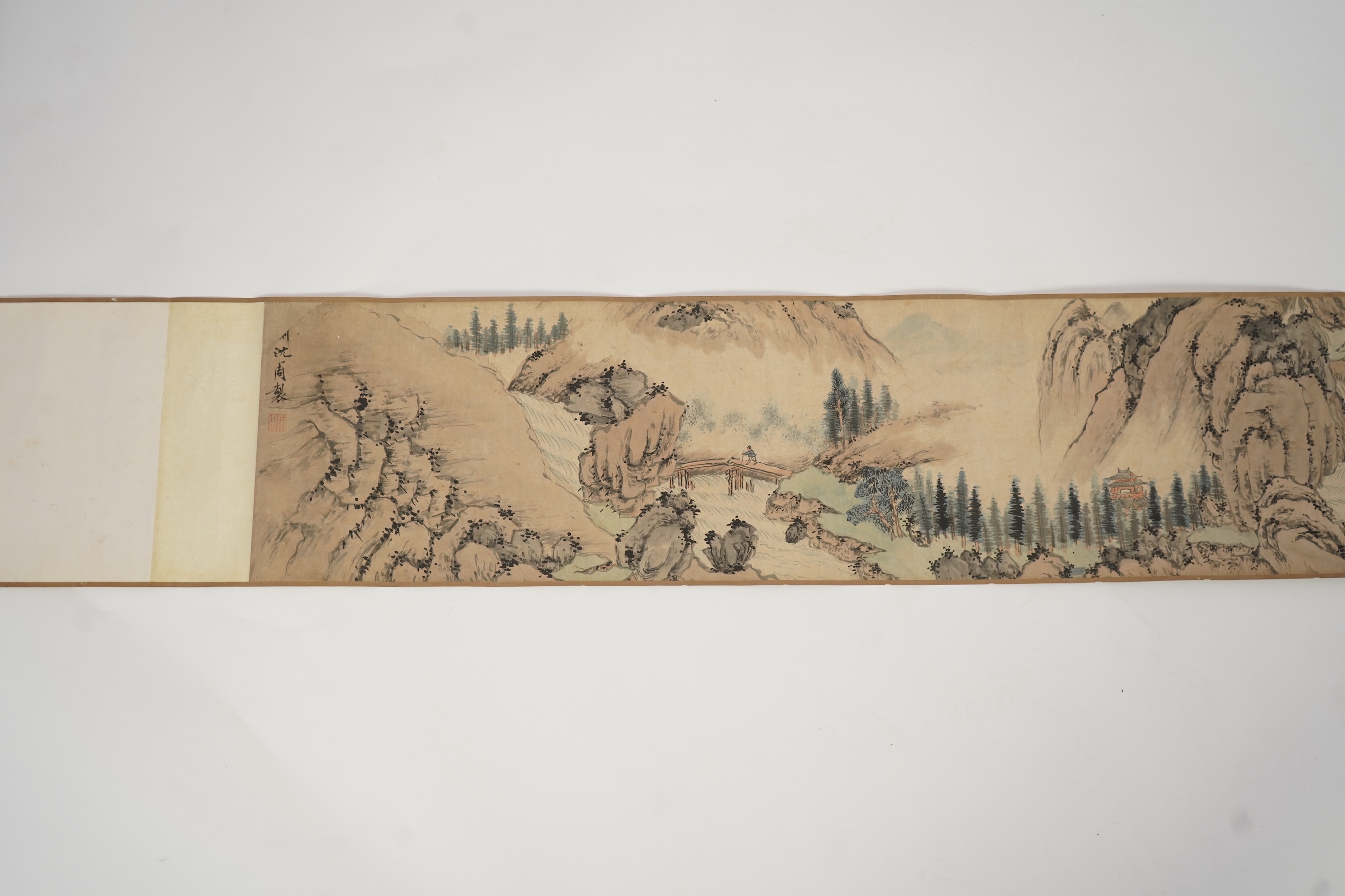Chinese School , (Qing dynasty), Figures in a mountainous river landscape, Ink and colour on paper handscroll, 268.5cm x 29cm excluding borders